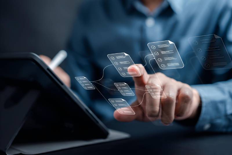 A designer mapping out the user flow for a custom enterprise application.